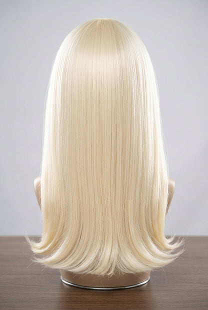 New Mistress 20-Inch Platinum Blonde Synthetic Wig with Bangs & Flipped Ends